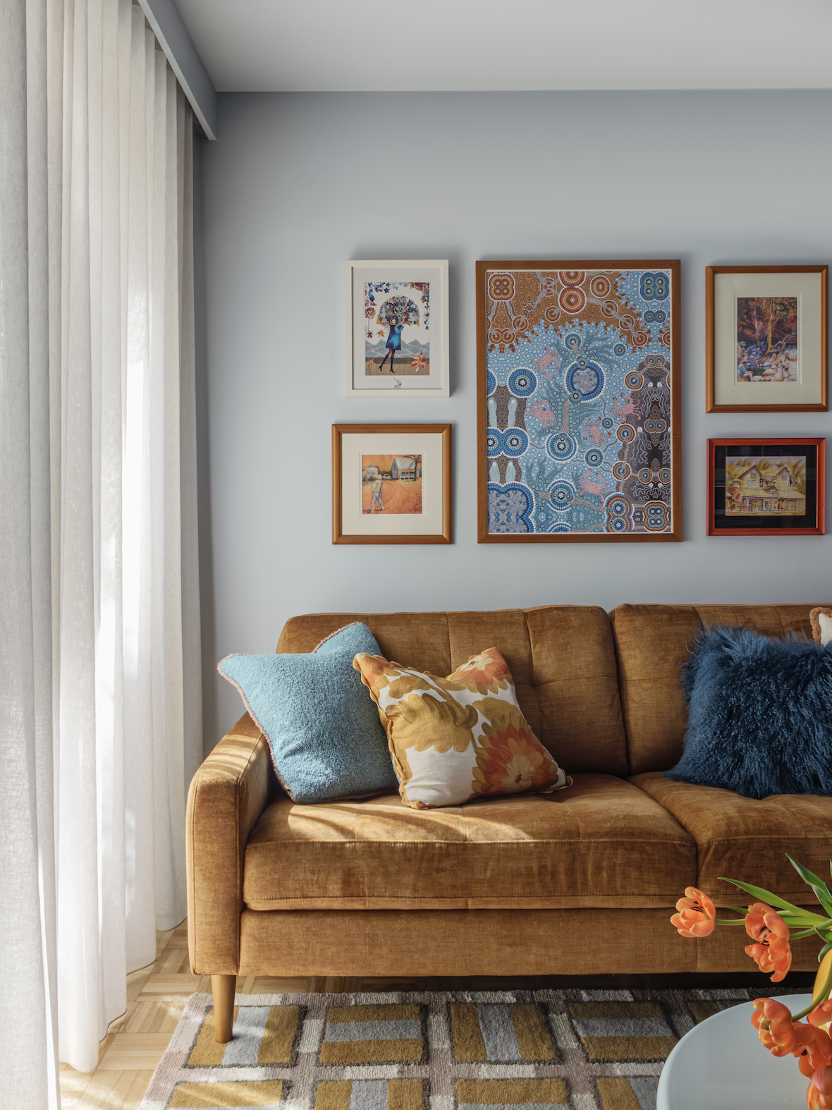 Nikki Weedon Interiors - St Kilda East colourful apartment interior decoration mustard sofa, blue paint and personality
